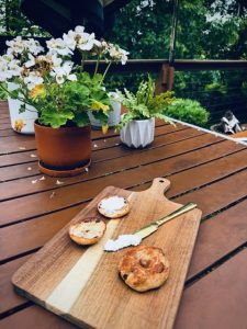 Weight watcher's cinnamon raisin sourdough bagels on a pretty table outside