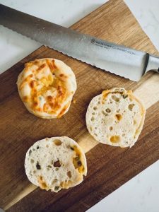 Weight watcher's sourdough jalapeño cheddar bagel sliced open